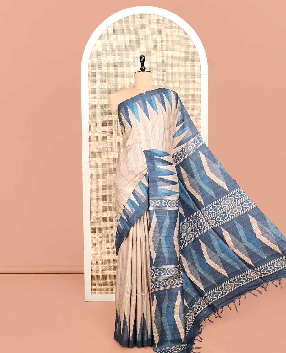 Cream Heathered Tussar Silk Saree, Complemented by a Contrast Temple Border, Contrast Ikkat Weave Pallu, and a Contrast Blouse