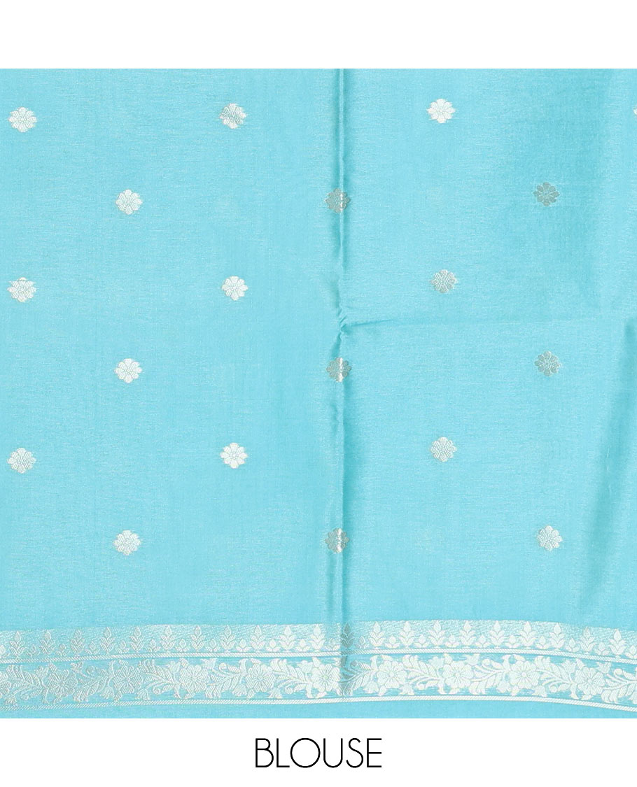 Borderless sky blue, geometric checks, and floral motifs fancy tussar saree, contrast traditional zari woven pallu, and a contrast zari design blouse