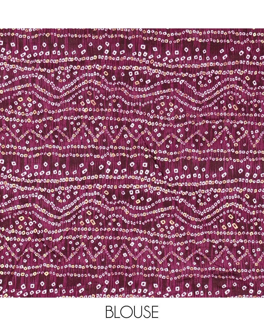 Blue plain Vichitra silk saree, contrast bandhani printed with Swarovski micro-stonework border, and a contrast bandhani printed blouse