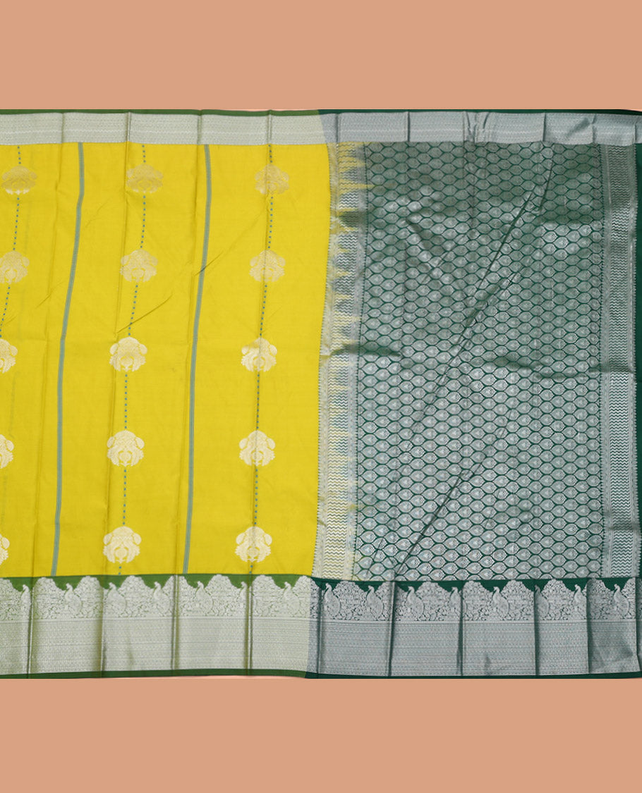 Green Budget Silk Saree, Prettified with Zari Buttas on Its Body, Complemented by a Contrast Traditional Zari Border, Grand Ogee Patterned Pallu, and Paired with a Contrast Blouse