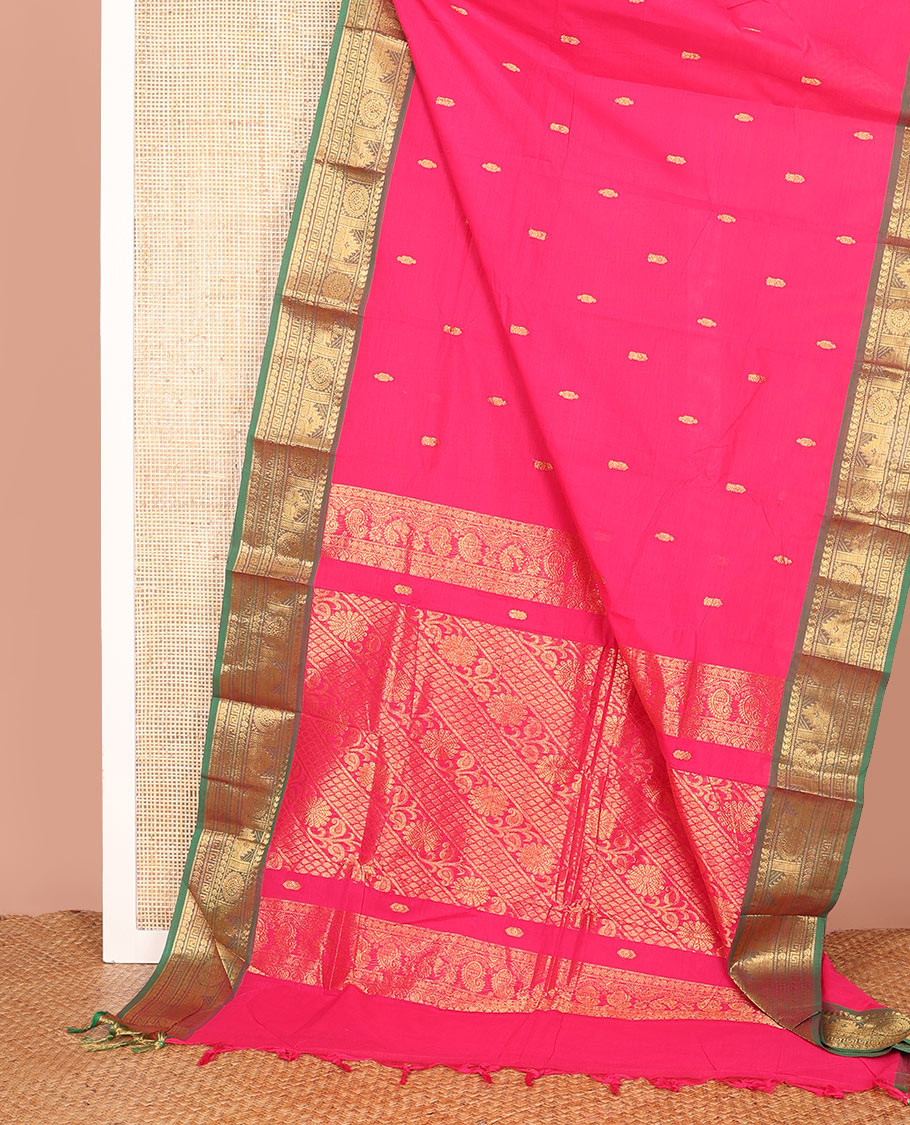 Pink Chettinad Cotton Saree Accentuated with Zari Buttas All Over Its Body, Complemented by a Contrast Border of Traditional Zari Designs, and Pallu Features Floral Creeper and Jaal Design