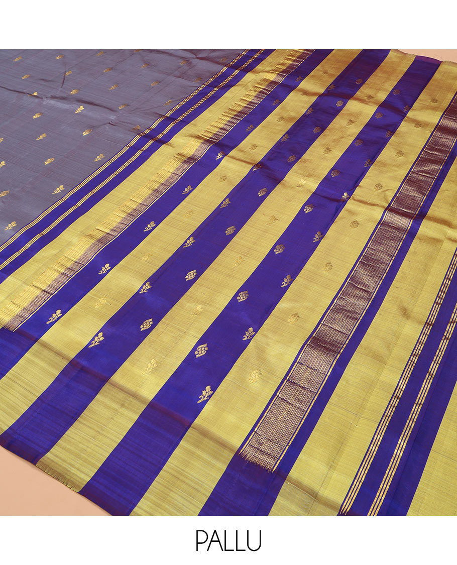 Grey Kanchipuram Silk Saree, Elevated with Zari Buttas, Complemented by a Contrast One-Sided Thazampoo Rekku Border, Zari Woven Pallu, and a No Blouse