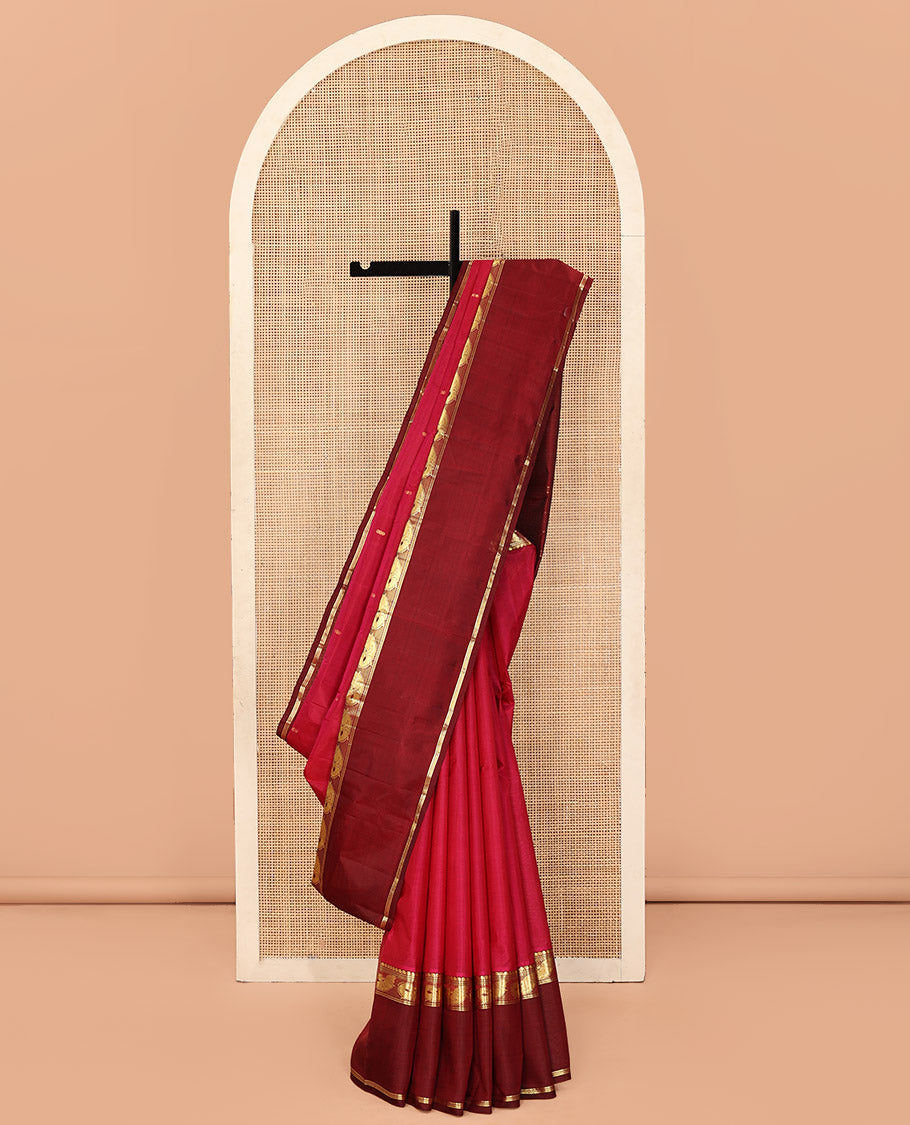 Red Plain Kanchipuram Silk Saree, Complemented by a Contrast Rettai Pettu Border of Manga, Neli, Banaras, and Meen Designs, Pallu of Zari Designs, and Paired with a Contrast Blouse
