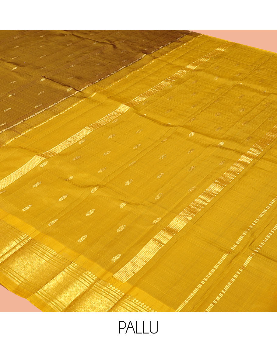 Green Kanchipuram Silk Saree, Elevated with Zari Buttas, a Contrast One-Sided Border of Paneer Sombu, Banaras, Muthu, and Jaal Designs, a Zari Design Pallu, and No Blouse