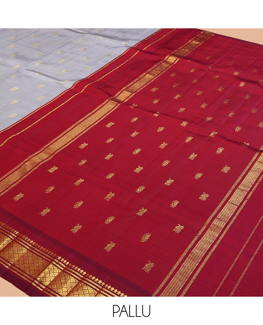 Grey Kanchipuram Silk Saree, Elevated with Zari Buttas, a Contrast One-Sided Border of Thazhampoo Rekku, Paneer Sombu, Banaras and Mayil Kann Design, Zari Design Pallu, and No Blouse