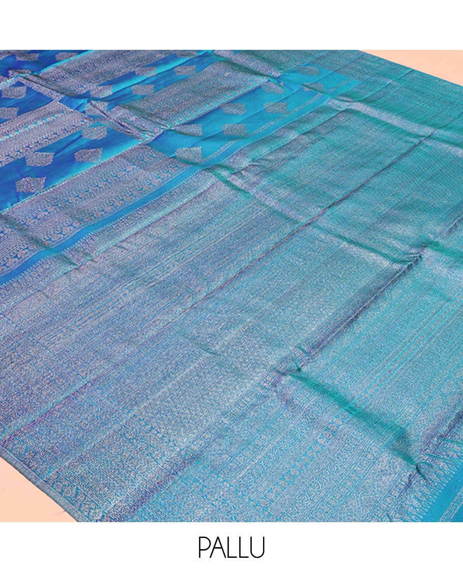 Blue Kanchipuram Designer Silk Saree, Subtly Enriched with Zari Designs Woven All Over Its Body, Highlighted by Zari Traditional Border, Zari Woven Pallu, and Paired with a Matching Blouse