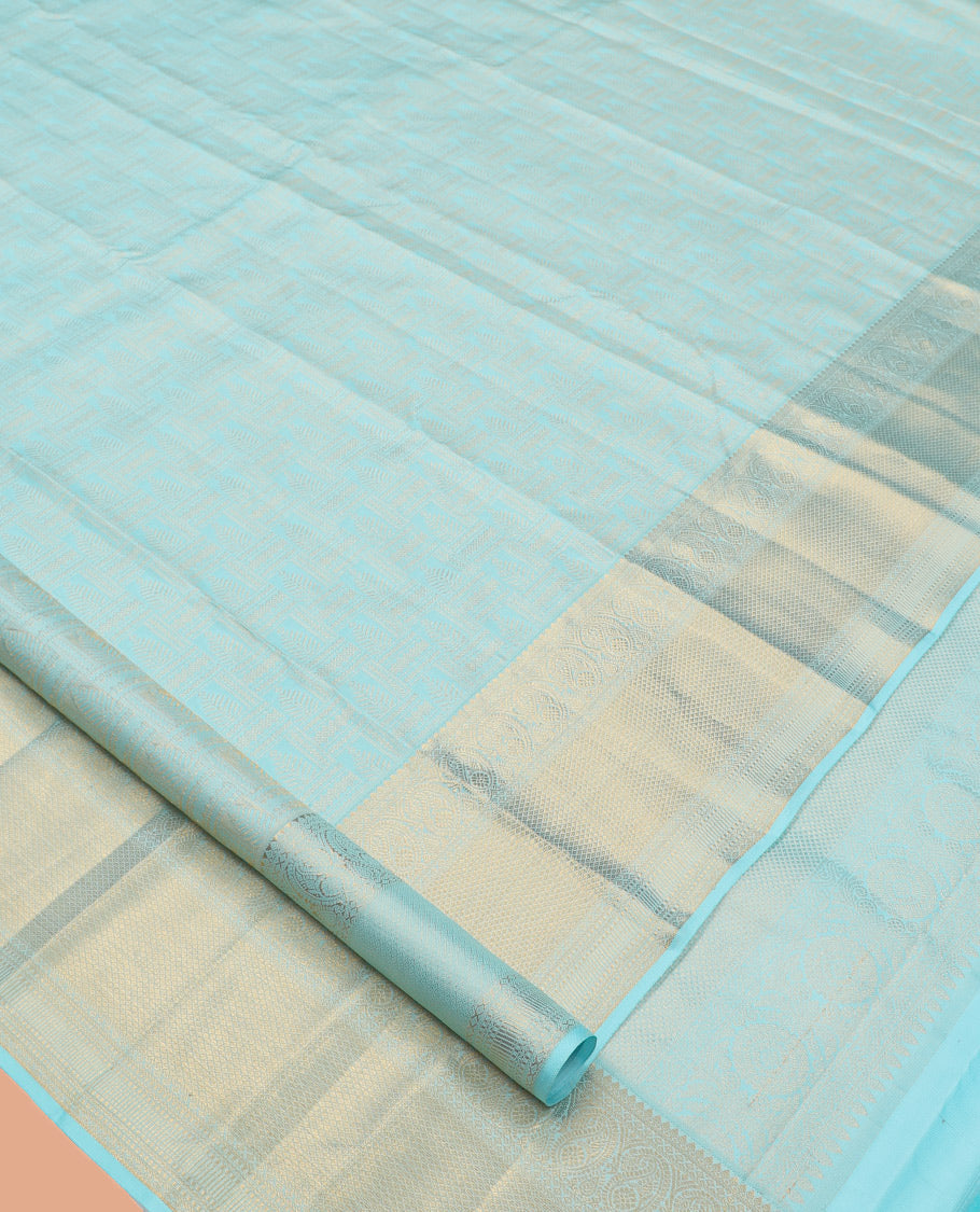 Pale Blue Jacquard Kanchipuram Wedding Silk Saree, Highlighted by a Zari Border of Thilakam Mokku, Arumbu Manga, and Mayil Kann Designs, Grand Jaal Pallu, and Matching Blouse