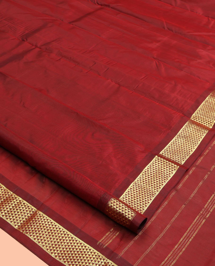 Red Kanchipuram Silk Saree, Adorned with Zari Buttas, Complemented by a Semi-Contrast Ara Madam Border, Pallu of Zari Design, and Matching Blouse