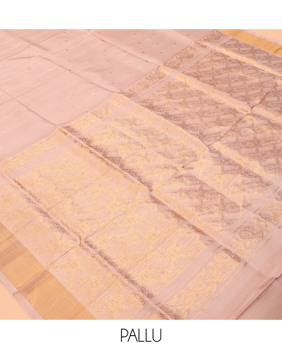 Peach Uppada Silk Saree, Ornamented with Zari Buttas, a Bavanji Border, Floral Jaal Pallu, and a Matching Blouse