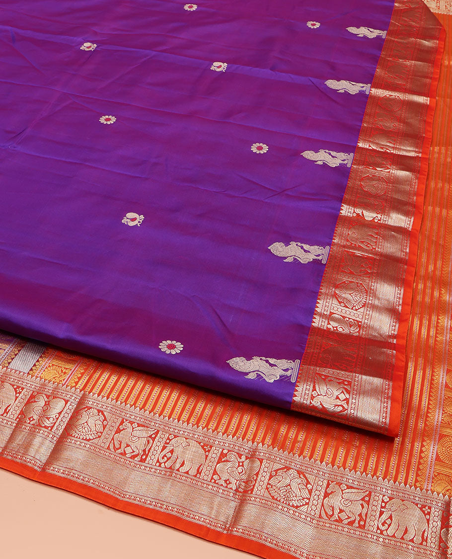 Purple Vasundhara Silk Saree, Embellished with Meena Buttas and Singam Buttas All Over Its Body, Complemented by Contrast Border of Rekku, Banaras, Yaanai, Mayil, and Vanki Designs, Pallu of Muthu Designs, and Paired with a Contrast Blouse