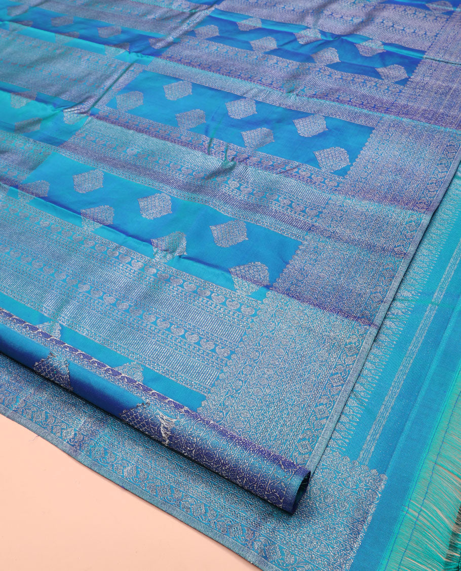 Blue Kanchipuram Designer Silk Saree, Subtly Enriched with Zari Designs Woven All Over Its Body, Highlighted by Zari Traditional Border, Zari Woven Pallu, and Paired with a Matching Blouse