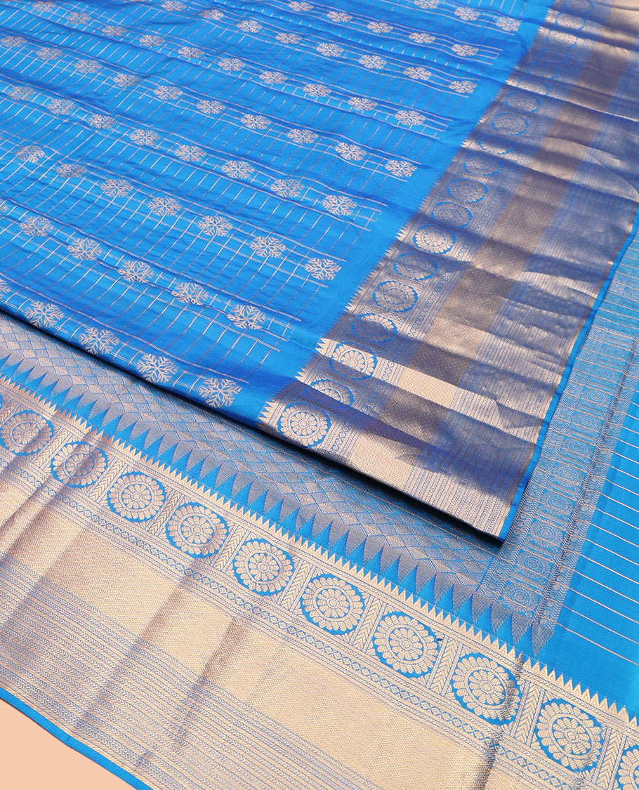 Blue Vasundhara Lite-Silk Mix Saree, Artfully Woven with Snowflake Buttas Enclosed Checks, Highlighted by Zari Border of Rekku, Chakram, Kathir, and Diamond Designs, Gleaming Jaal Pallu, and Paired with a Matching Blouse