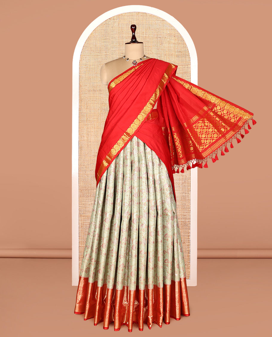 Pale Green Art Silk Half-Saree, Embellished with Jacquard Design, Contrast Traditional Zari Border, Paired with a Contrast Jacquard Blouse, and an Intricate Dhavani