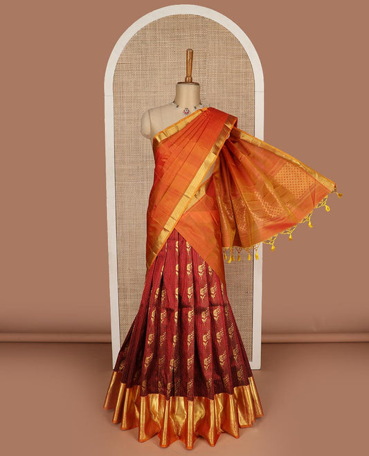 Maroon pure silk half saree, zari design skirt, contrast border and blouse of thilakam mokku, muthu, rudraksham, and manga design, and zari design dhavani