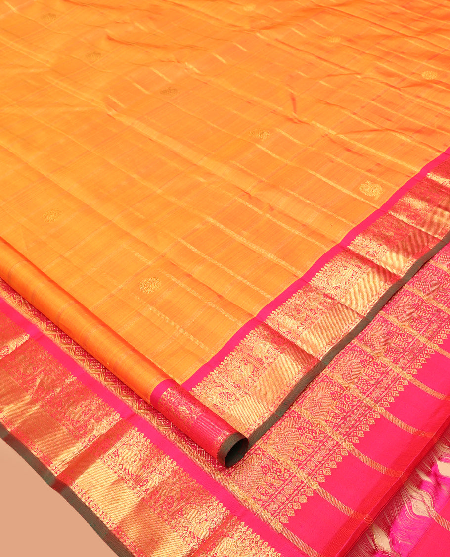Orange Kanchipuram Silk Saree, Adorned with Mayil-Chakram Buttas and Stripes, Complemented by a Contrast Border of Thilakam Mokku, Rudraskham, Mayil, and Yaanai Design, Jaal Pallu, and a Contrast Blouse
