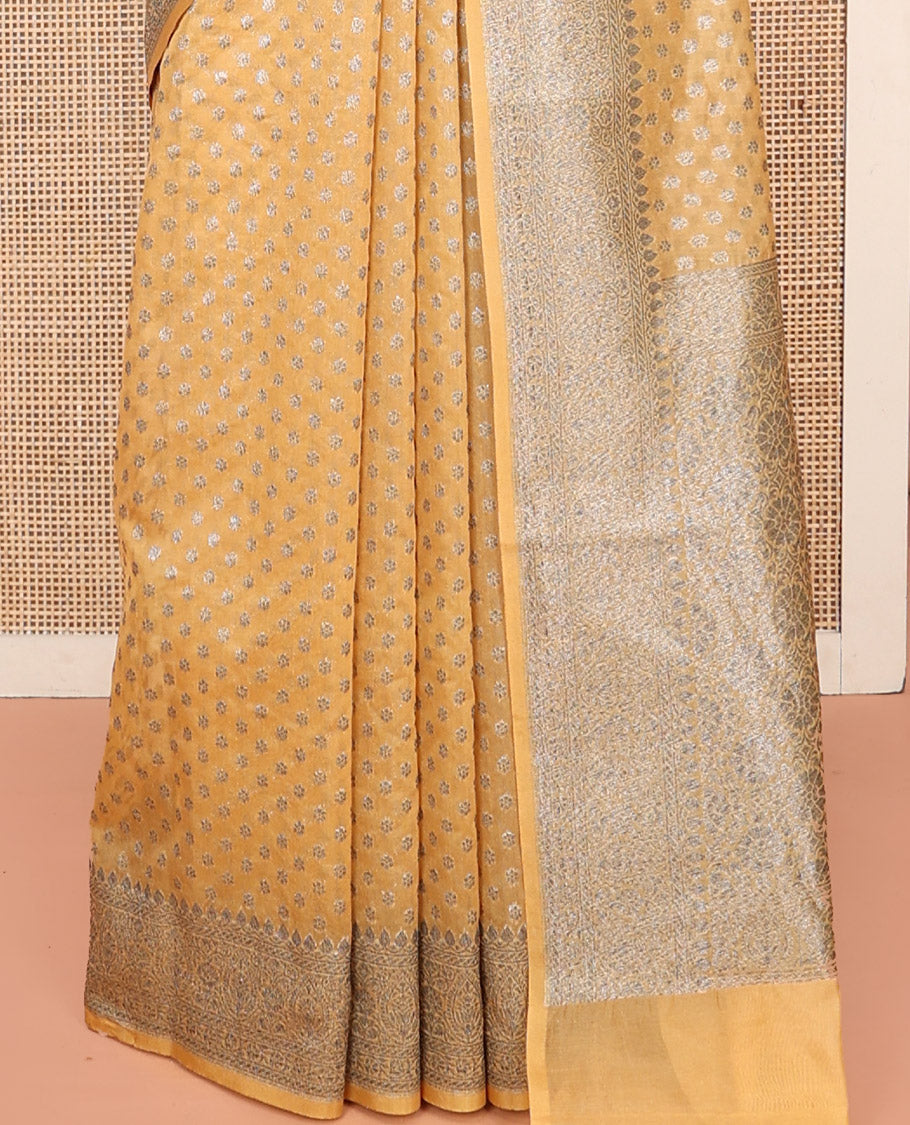 Yellow Georgette Saree, Steeped with Buttas, Highlighted by a Traditional Border, Intricately Designed Pallu, and a Matching Blouse