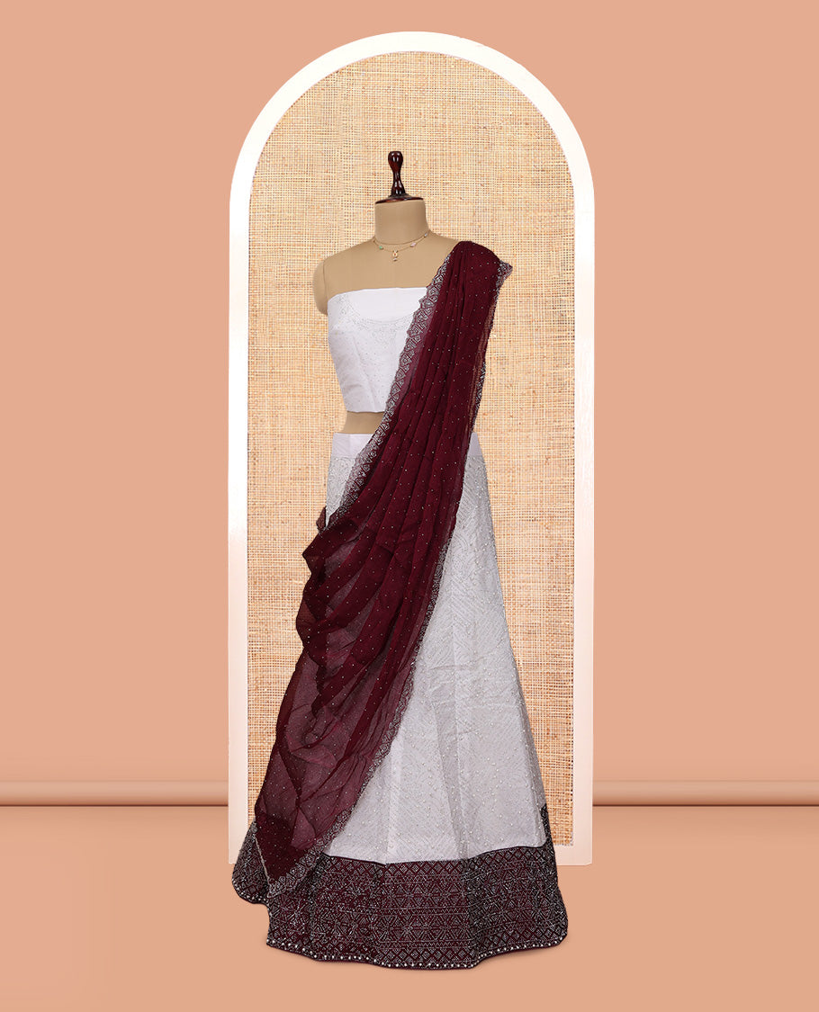 Off-white Banarasi Half-Saree, Finely Crafted with Bead Work Skirt, a Contrast Stone Work Border, Matching Blouse, and Contrast Scallop Stone Work Dupatta