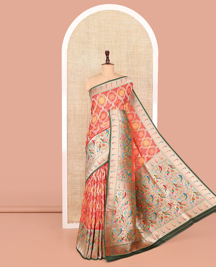 Orange Dola Silk Saree, Beautifully Bedecked with Bandhani Ghar Chola Patterns on Its Body, Complemented by Contrast Muniya Paithani Floral-Peacock Border, Pallu of Muniya Paithani Floral-Peacock Design, and Paired with a Contrast Blouse