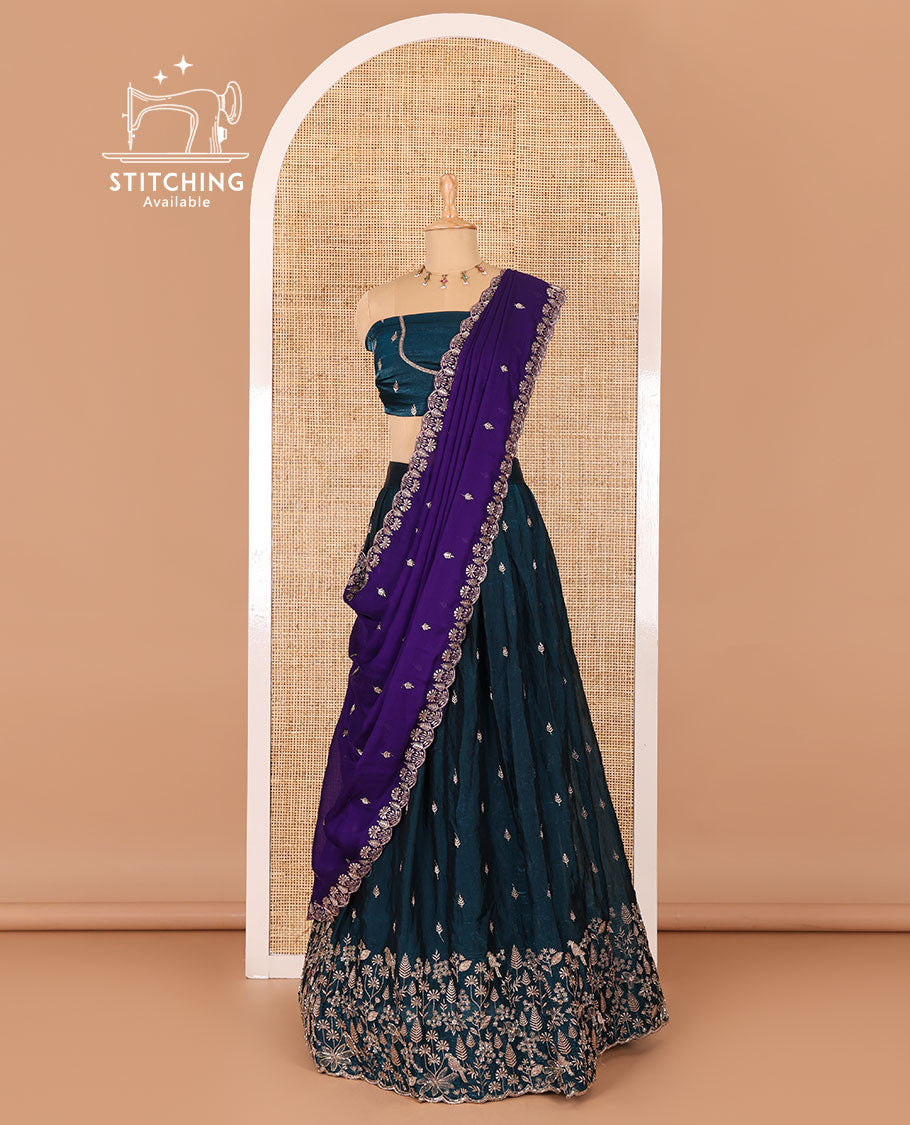 Peacock blue half-saree, floral and bird motifs embroidered velvet organza top, matching embroidered blouse, and contrast scallop embroidered syska georgette dhavani