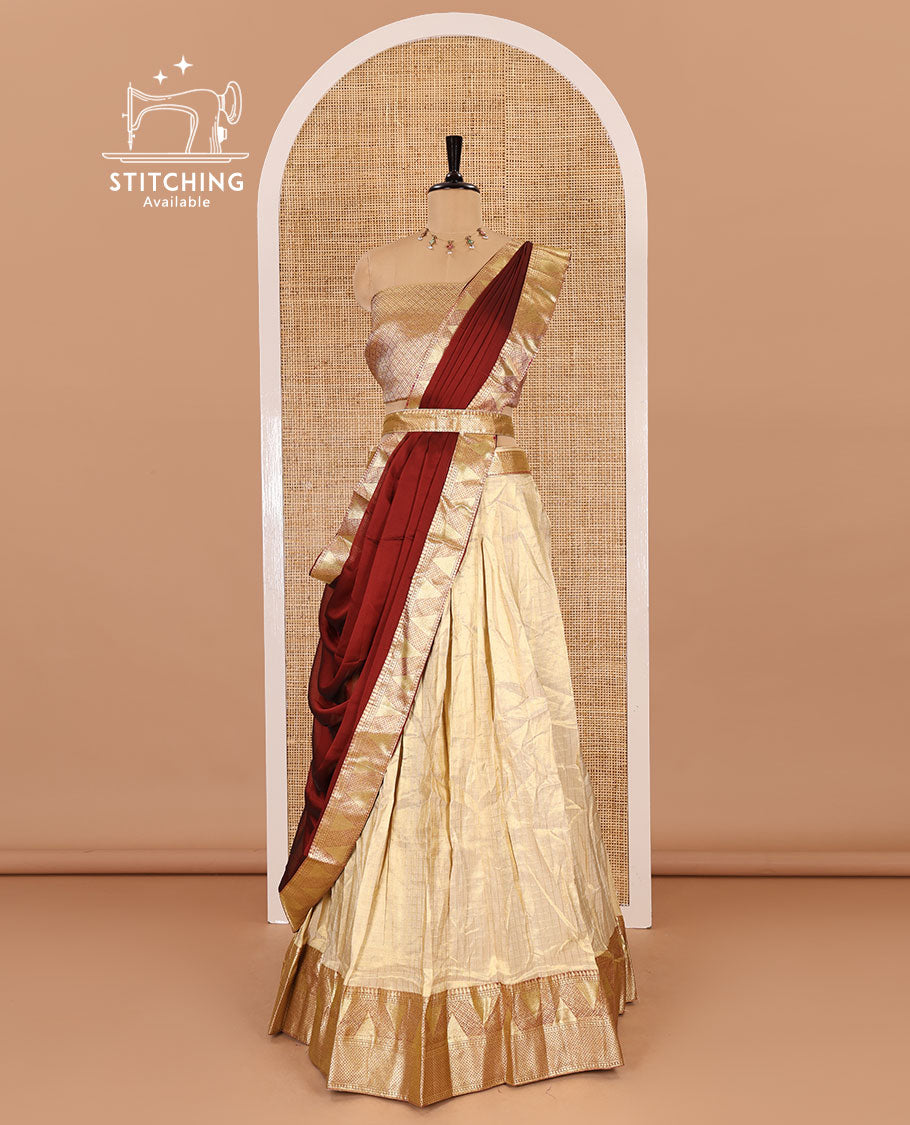Chikku and maroon half-saree, zari checked with contrast traditional zari bordered banarasi skirt, jacquard blouse, and a contrast zari bordered syska georgette dhavani