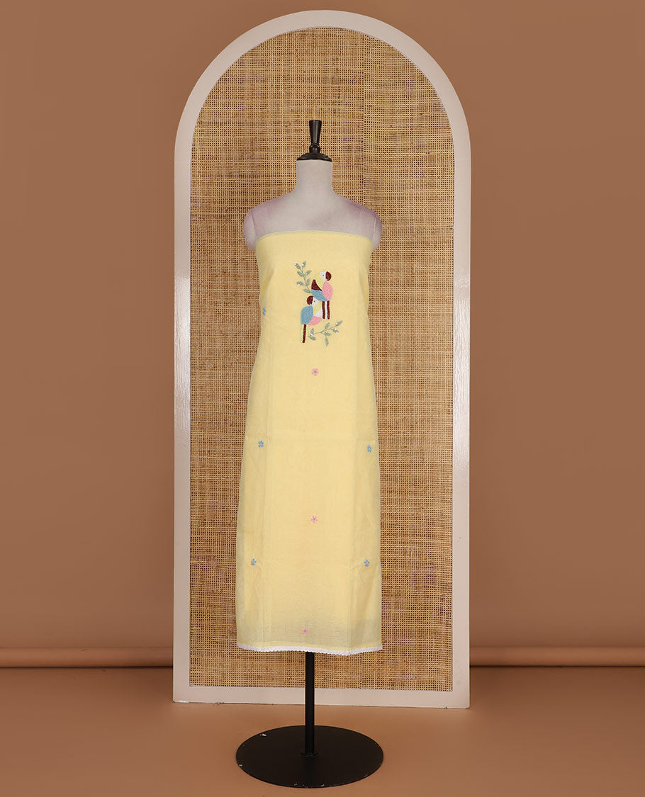Yellow net kota material chudidar set, macaw parrot, and flower motifs, multi-color sugar bead embroidered top, plain santoon bottom, and sugar bead embroidered dupatta