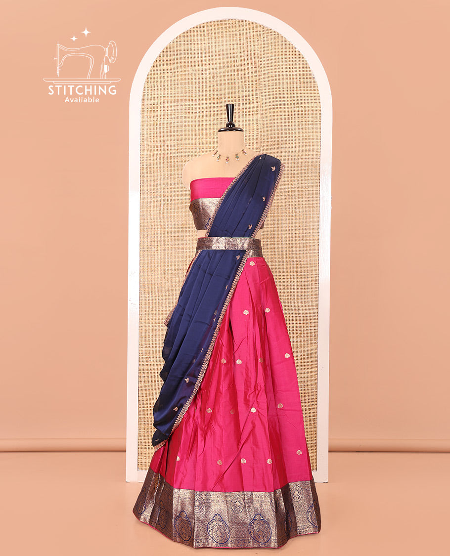 Pink and Navy Blue Semi-Banarasi Half-Saree, Elegantly Woven with Zari Buttas on Its Skirt, Complemented by a Contrast Intricately Zari-Designed Border, Paired with a Matching Blouse, and a Contrast Satin Georgette Embroidered Scallop Dhavani