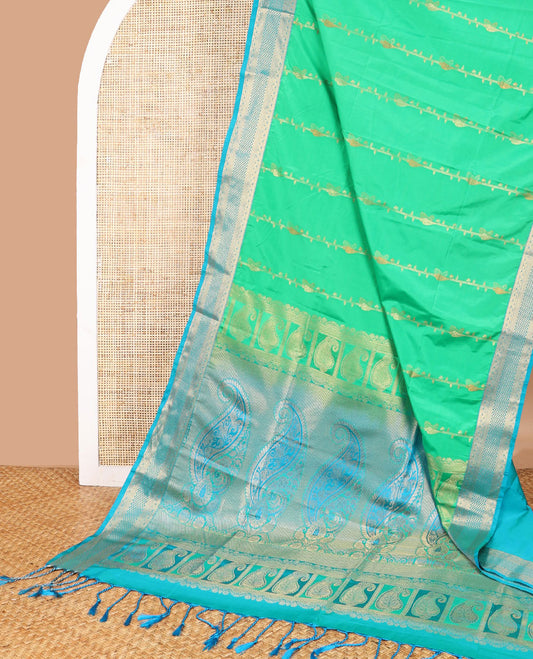 Sea green floral design soft silk saree with contrast intricate zari design border & paisley design pallu