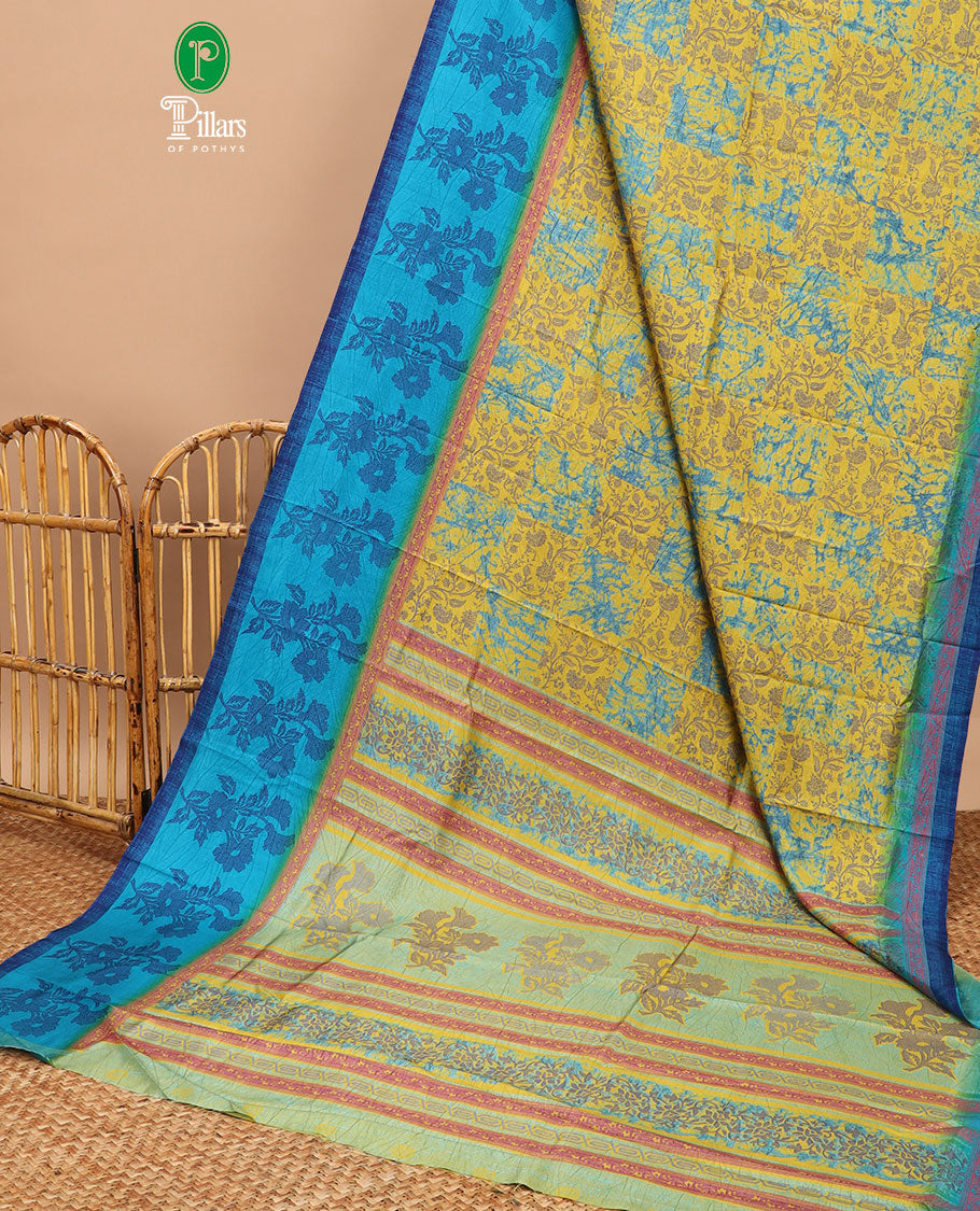 Yellow discharge print crackle silk saree with contrast border & discharge negetive print blouse