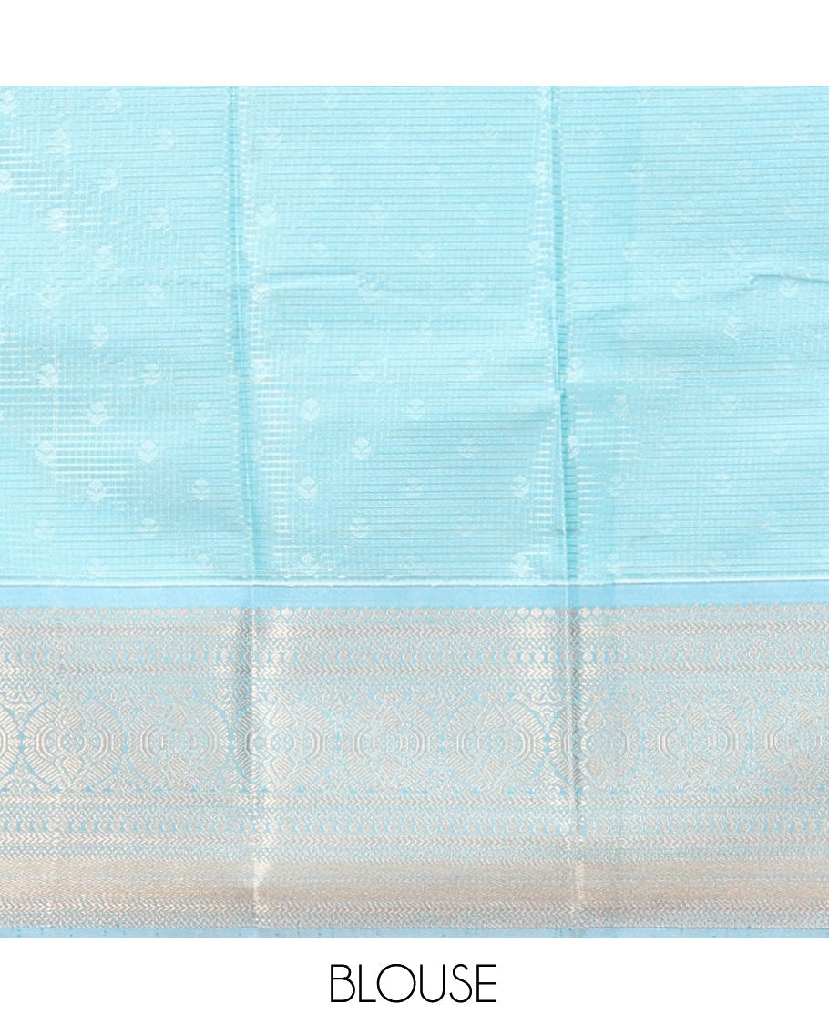 Orange Art Silk Half-Saree Pavadai Material Features a Zari-Buttas Skirt, a Contrast Traditional Border, Contrast Blouse, and Intricate Dhavani