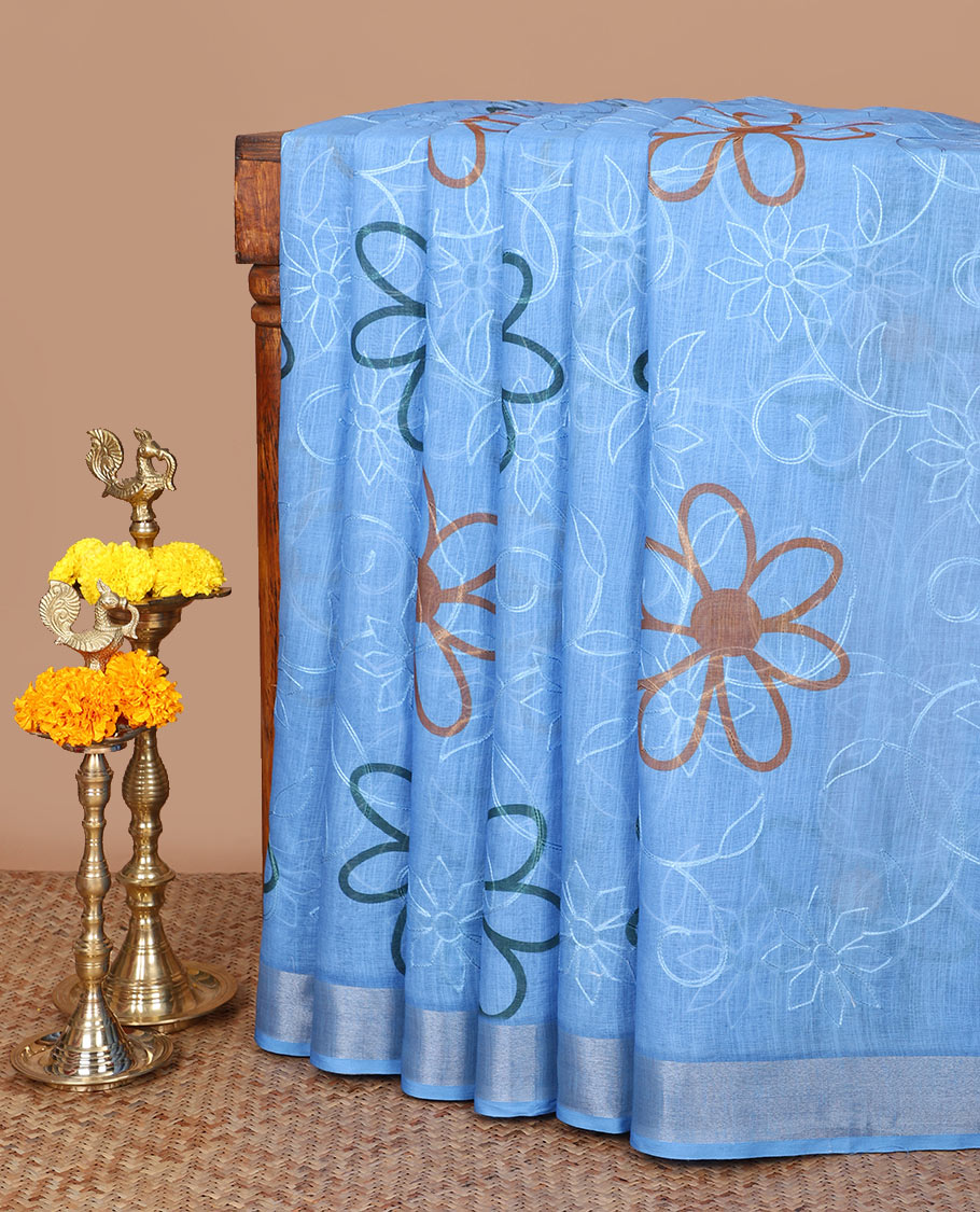 Blue floral buttas embroidery linen saree with bhavanji border & self pallu along with butta printed blouse