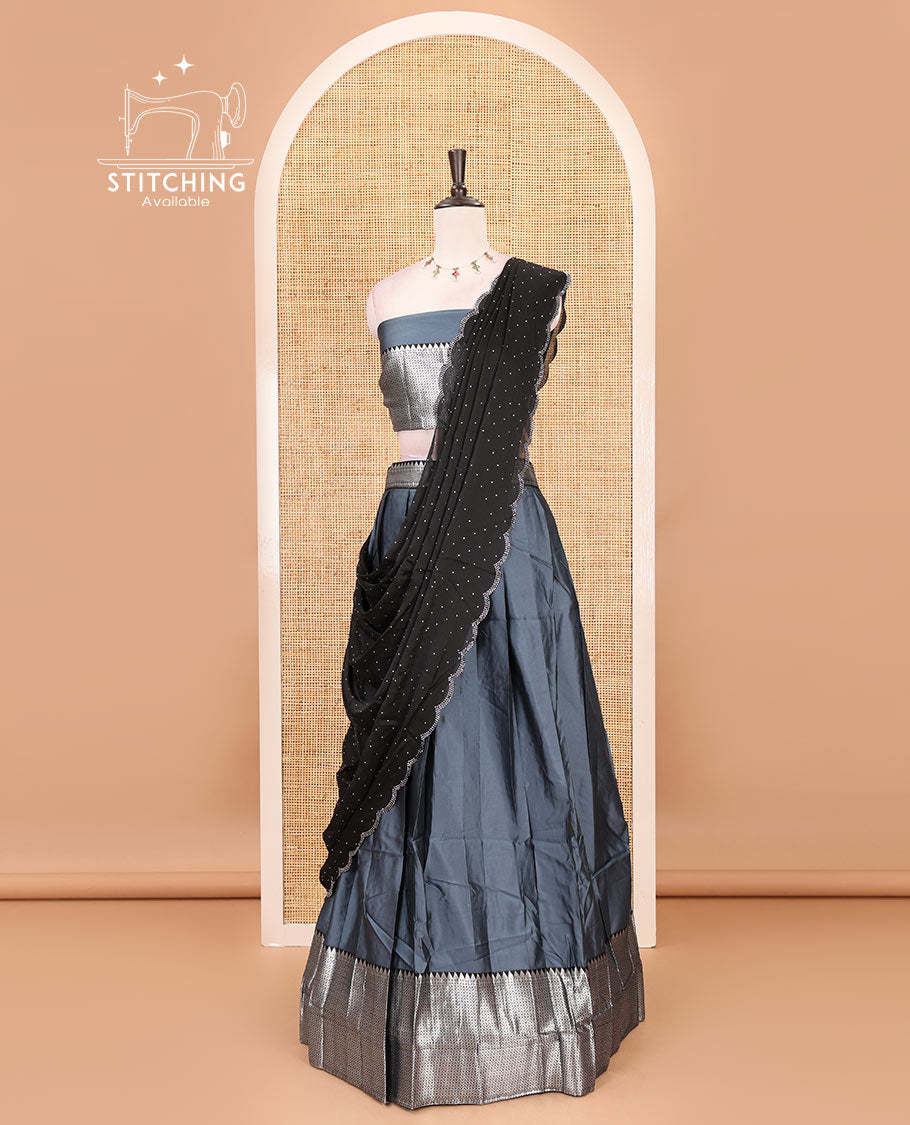 Grey-black taffeta silk half-saree, plain & contrast temple & kathir boder skirt, matching blouse & contrast stonework scallop border syska georgette dhavani