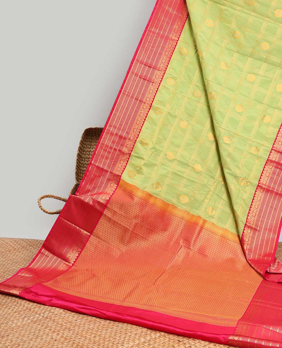 Green leaf motifs enclosed checked design gift saree with contrast zari design border & checked zari design pallu