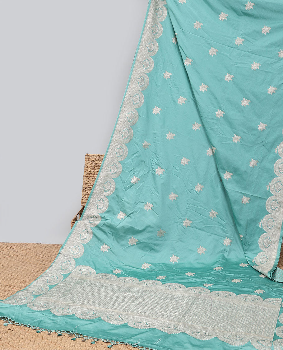 Green motifs satin silk saree with self floral motifs border & intricate zari design pallu
