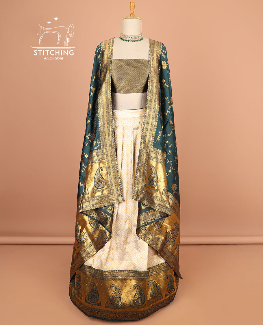 Cream buttas half saree with contrast zari design border, zari design blouse & bottle green floral vine zari design dhavani