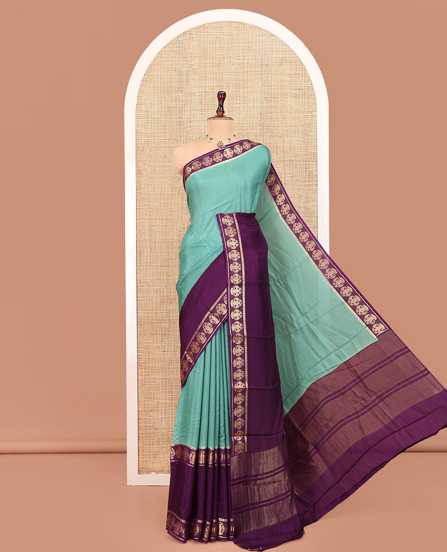 Olive Green Plain Dola Silk Saree, Complemented by Contrast Rettai Pettu Ganda Berunda Motifs, Zari Border, Gleaming Zari Striped Pallu, and Paired with a Contrast Blouse