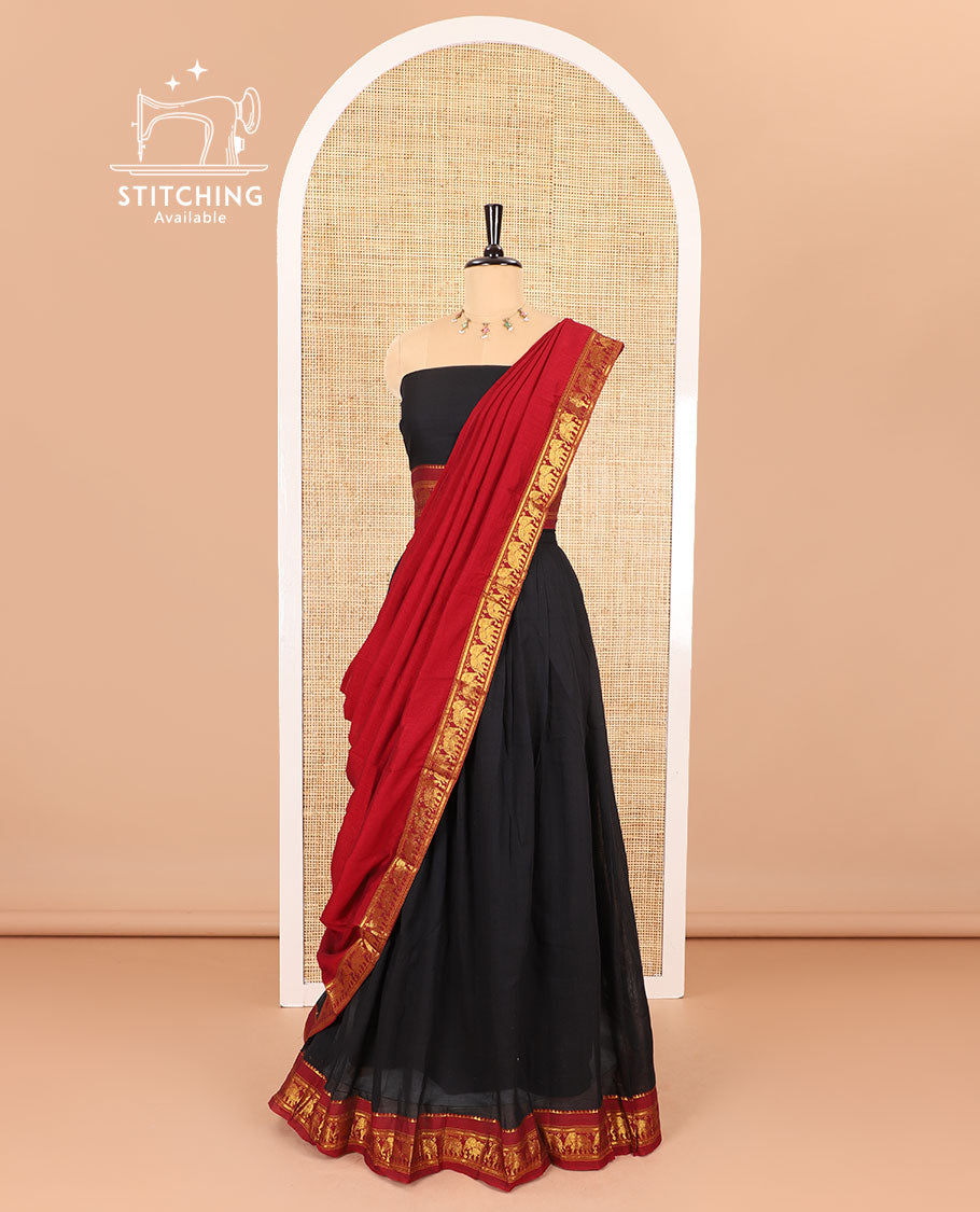 Black half-saree, plain with contrast traditional zari elephant border skirt, matching blouse, and a contrast zari border dupatta