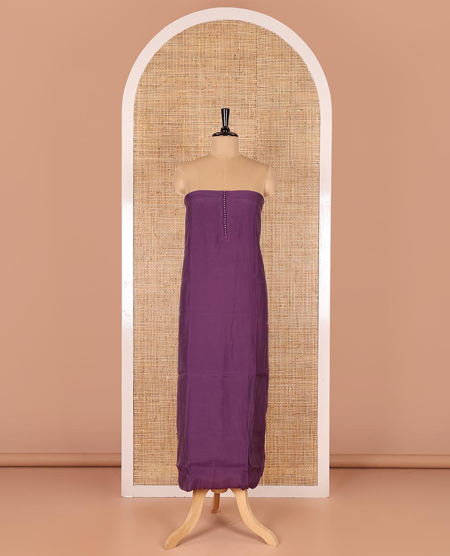 Lavender material chudidar set, plain with pom-pom tasseled mul chanderi top, a matching bottom, and organza dupatta of stripes