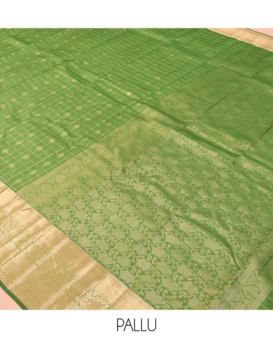 Green Vasundhara Lite Silk Mix Saree, Ornamented with Zari Buttas and Checks, a Zari Border of Thilakam, Kodi Visiry, and Kuyil Kann Designs, Grand Pallu, and a Matching Blouse