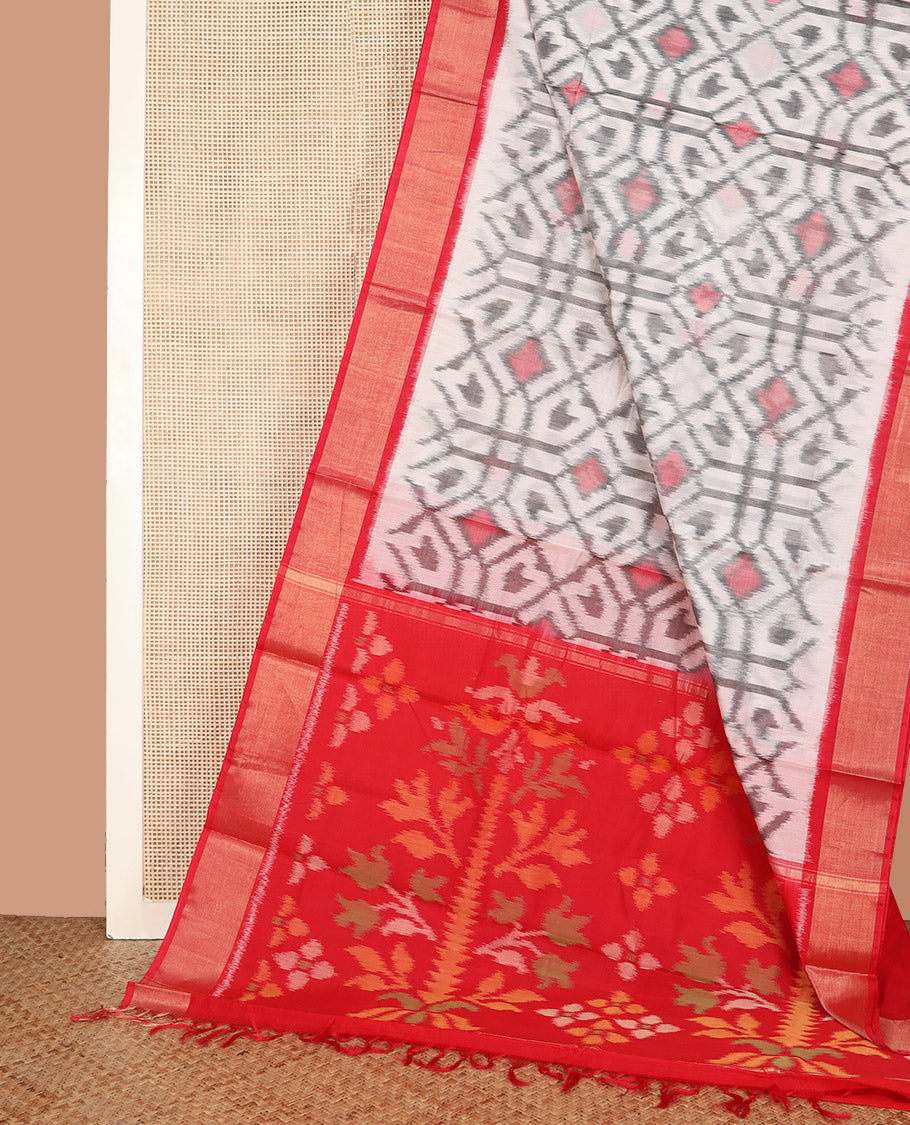 Off-White Ikkat Cotton Saree, Delicately Woven with Ikkat-Style Geometric Patterns All Over Its Body, Complemented by a Contrast Border, Pallu of Floral Designs in Ikkat Weave, and Paired with a Contrast Blouse