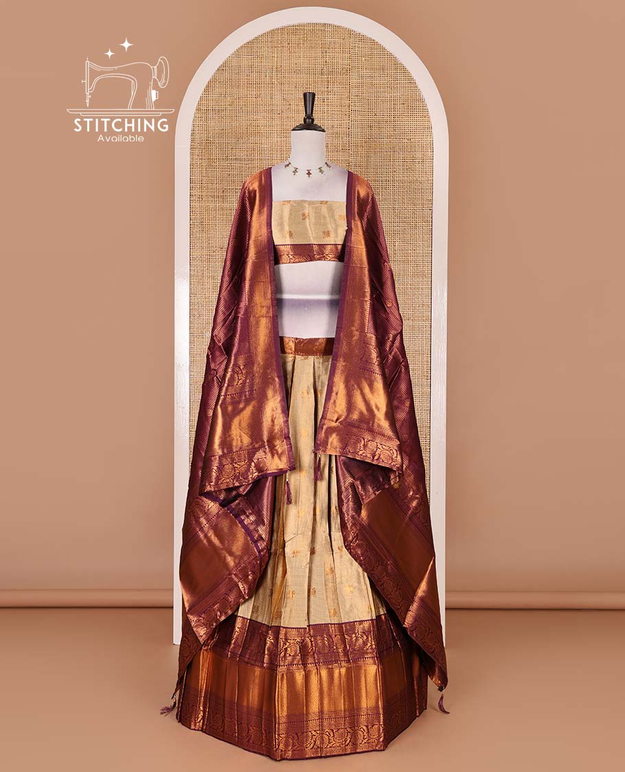 Gold banaras half saree, zari buttas with contrast wine traditional zari border skirt, matching blouse, dhavani of zari checks, and buttas