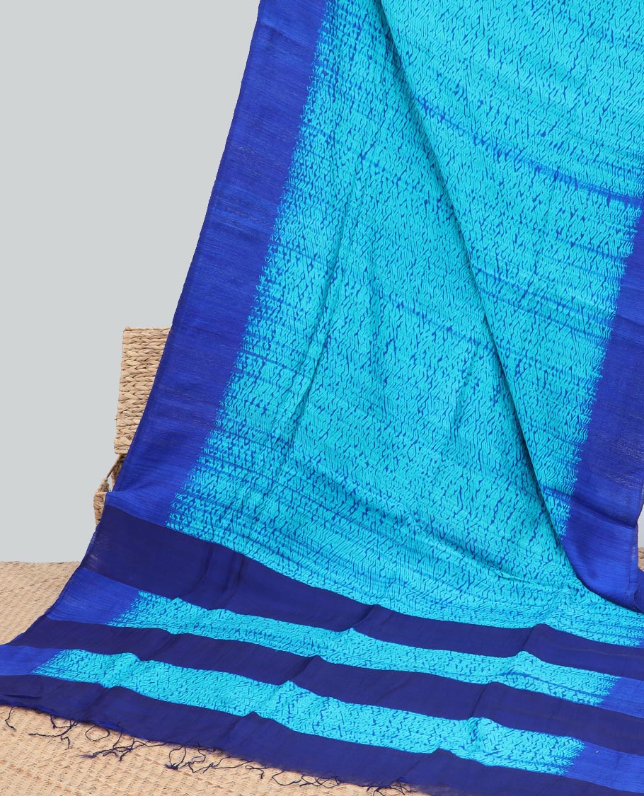 Blue abstract design matka silk saree with contrast plain border & blue abstract design pallu