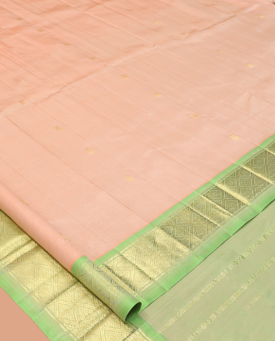Peach Kanchipuram Silk Saree, Woven with Zari Buttas, Complemented by a Contrast Border of Jaal Design, Pallu of Zari Design, and No Blouse