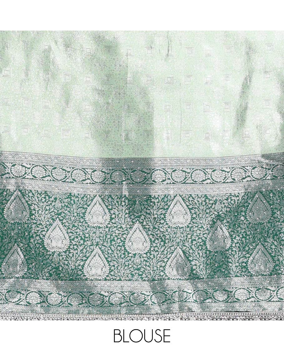Light green floral jacquard half saree with contrast floral zari design border , zari design blouse & floral embroidery dhavani