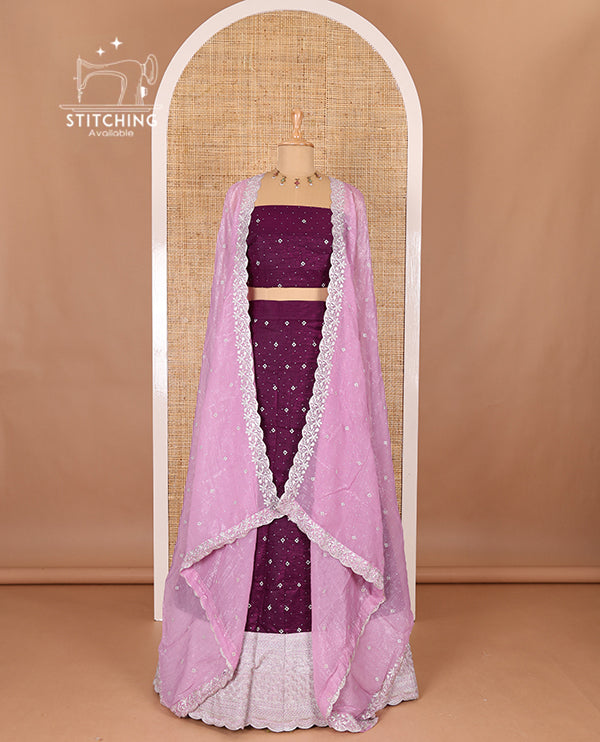 Purple half-saree, floral motifs embroidered semi raw silk top, matching embroidered blouse, and contrast scallop embroidered georgette dhavani