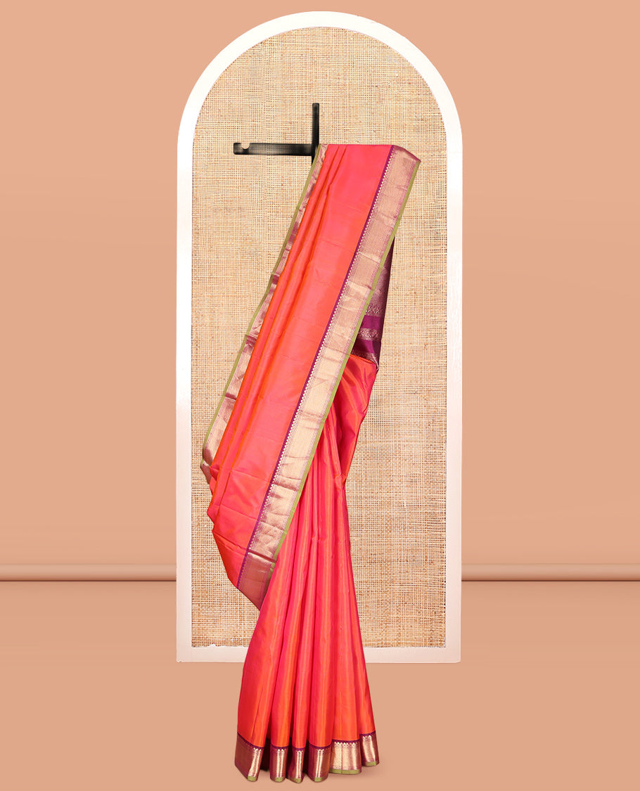 Orange Plain Kanchipuram Silk Saree, a Contrast Border of Thilakam Mokku, Banaras, Muthu, and Mayil Kann Designs, Intricately Patterned Pallu, and a Contrast Blouse