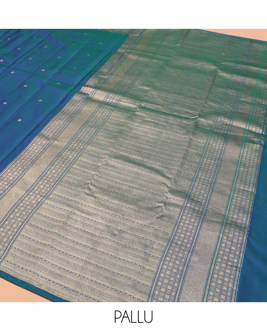 Blue Vasundhara Silk Saree, Accentuated with Zari Buttas All Over Its Body, Highlighted by a Zari Border of Manga and Yaanai Designs, Grand Geometric Patterned Pallu, and Paired with a Matching Blouse