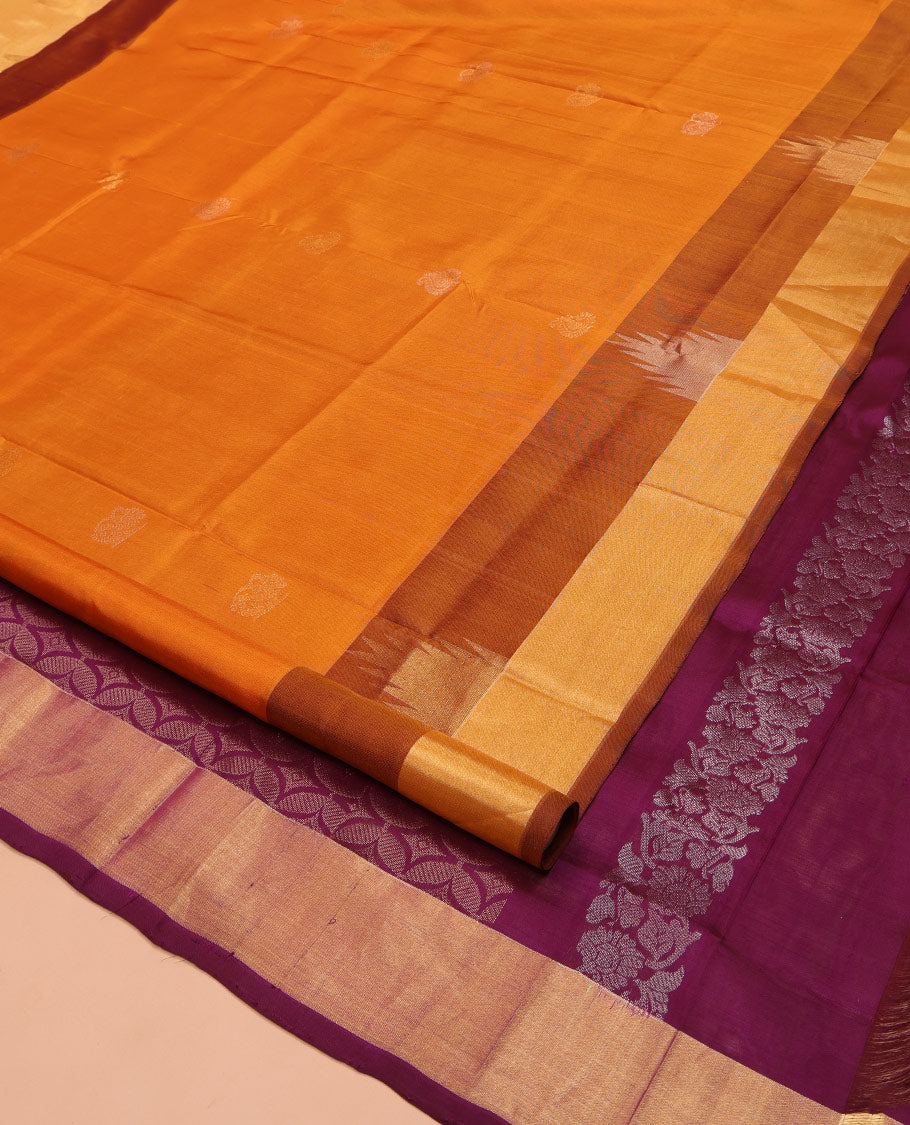 Orange Uppada Silk Saree, Sparsely Woven with Buttas All Over Its Body, Complemented by a Contrast Temple Border, Pallu Pictures Leaf Designs, and Paired with a Contrast Blouse