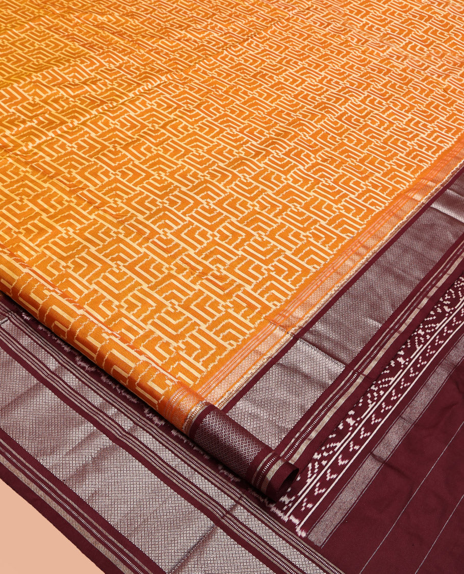 Yellow Pochampally Ikat Silk Saree, Decorated with Ikat Geometric Designs on Its Body, Complemented by a Contrast Zari Peacock-Eye Border, Ikkat Weave Pallu, and Paired with a Contrast Blouse