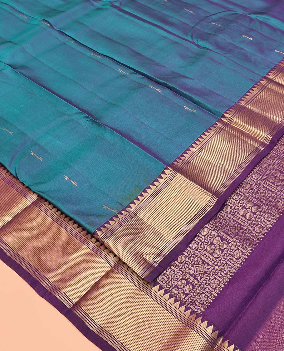 Blue Vasundhara Lite Silk Mix Saree, Sparsely Woven with Zari Buttas All Over Its Body, Complemented by a Contrast Temple Border, Grandly Decked Up Pallu, and Paired with a Contrast Blouse