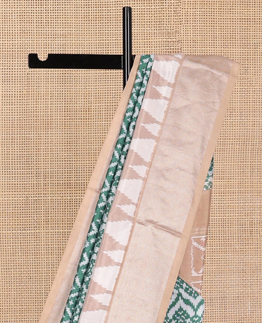 Green ikkat pure silk saree with floral & chevron ikkat design, contrast vidarbha border & ikkat design pallu